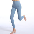 Calza celeste fitness mujer cintura alta con bolsillo